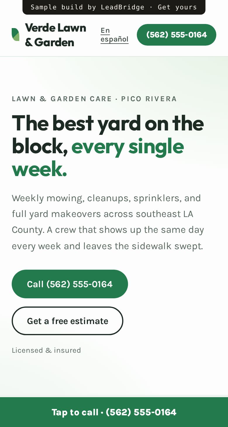Sample lawn care website on a phone